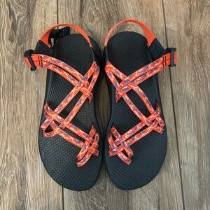 Chaco sandals in a pretty red with blue and cream design.